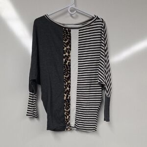 Stylish Women's Black and White Striped Blouse with Leopard Accent